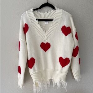 White Sweater with Red Heart Accents